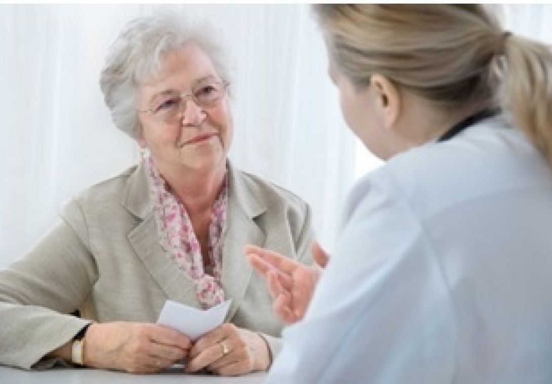 Woman in white jacket talking to senior woman | Philadelphia Home Care Agency | Neighborly Home Care