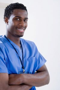 Smiling male nurse | elderly care for loved ones | Neighborly Home Care